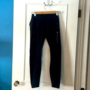 Athleta yoga pants size medium. with side zippers